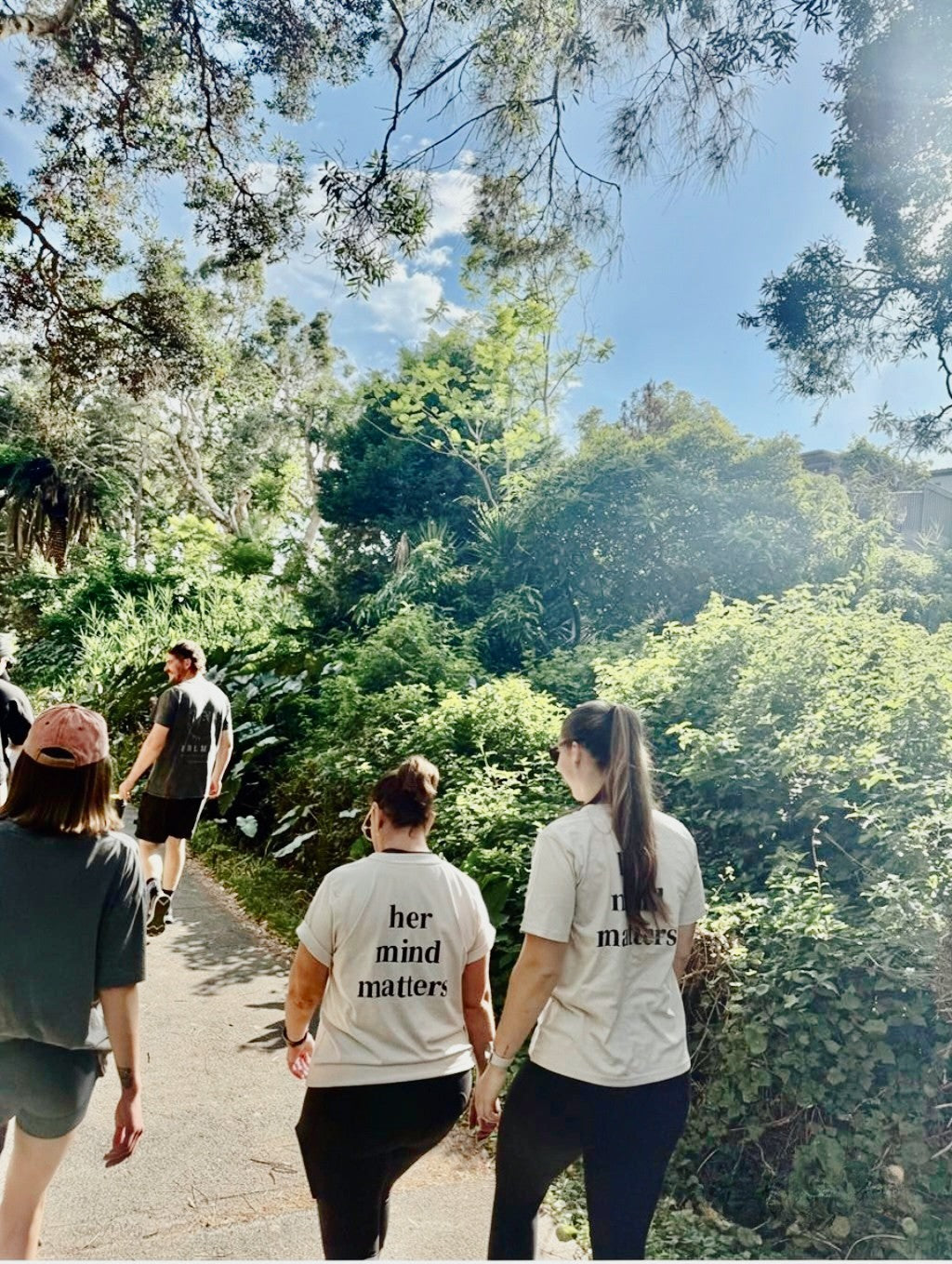 Beige DGF T-shirts on walk