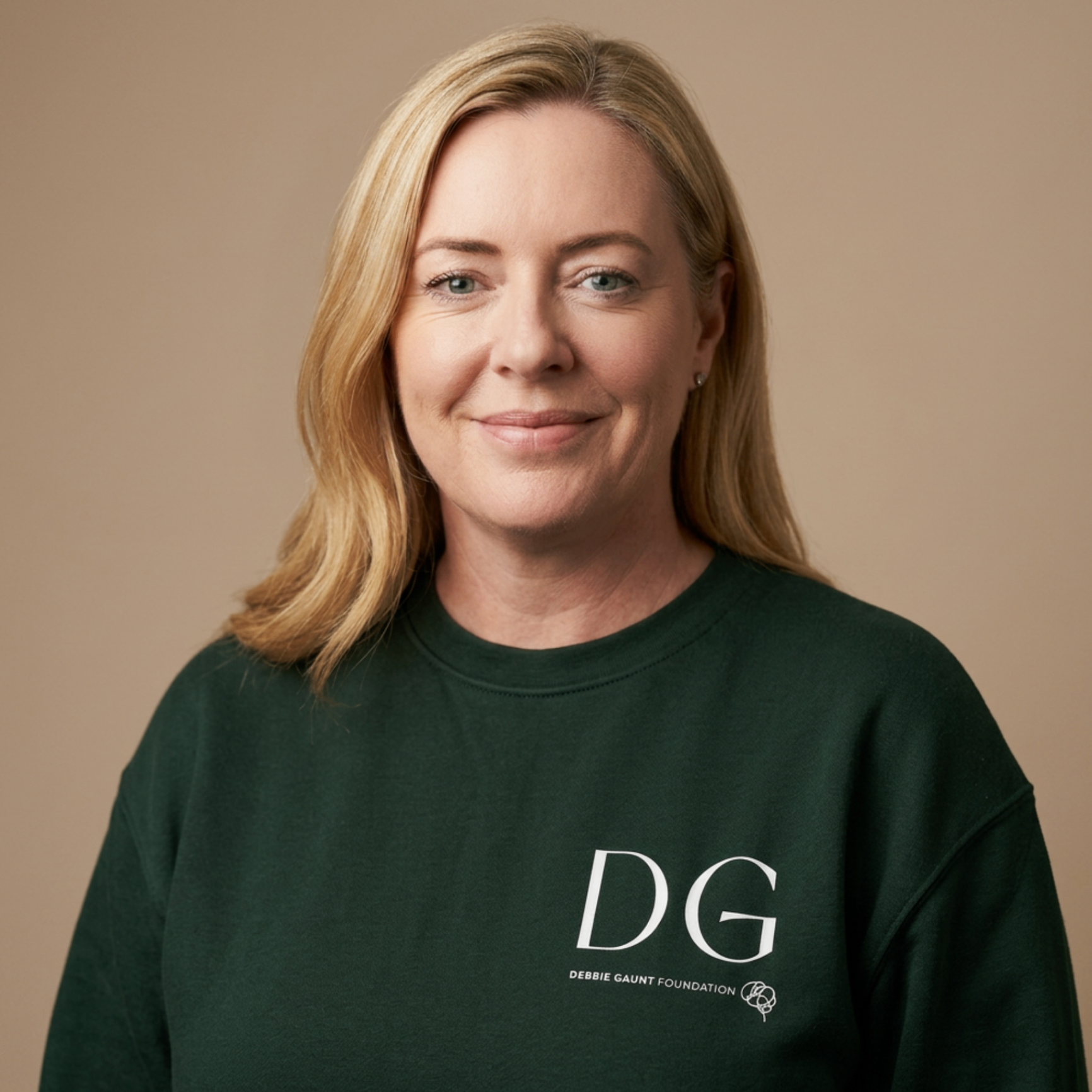 Unisex Jumper in Pine Green — front with DG logo