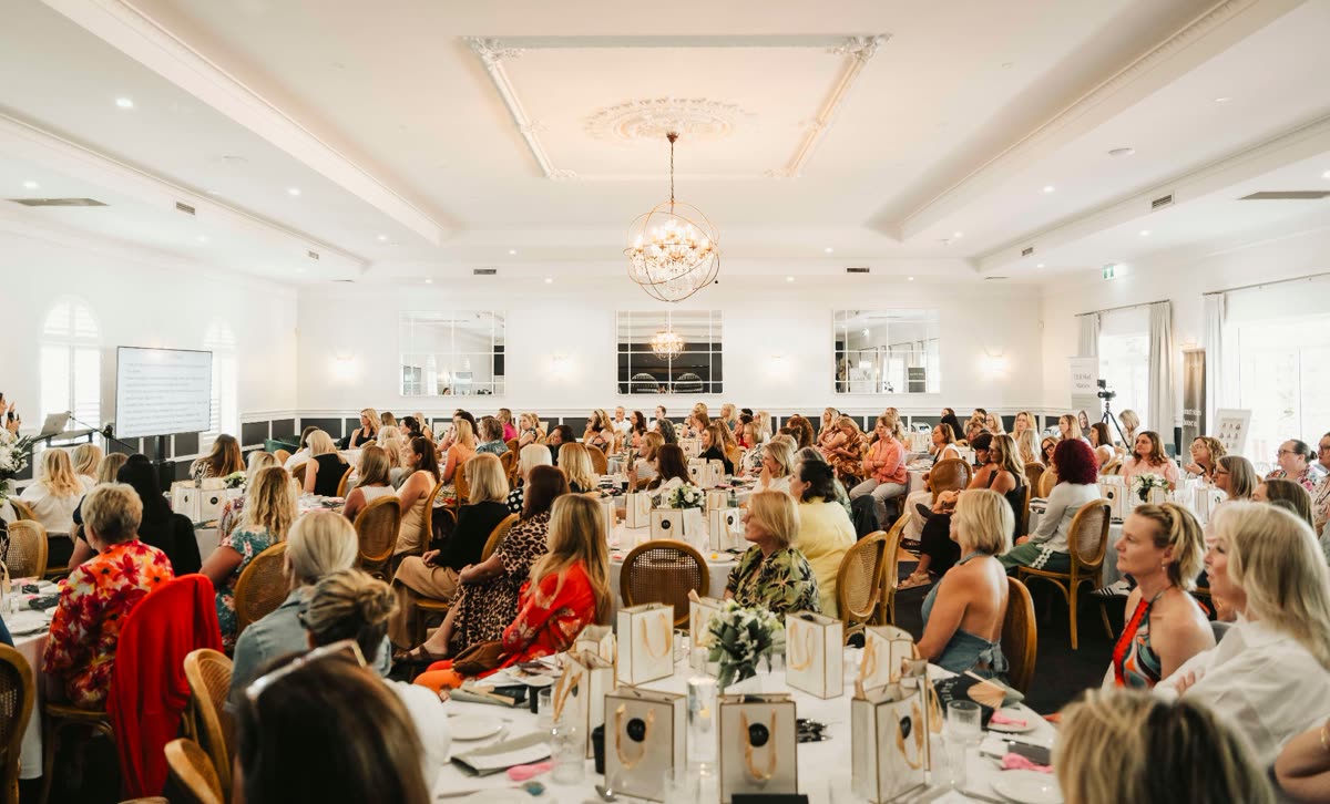 A room of women attending a community education event.