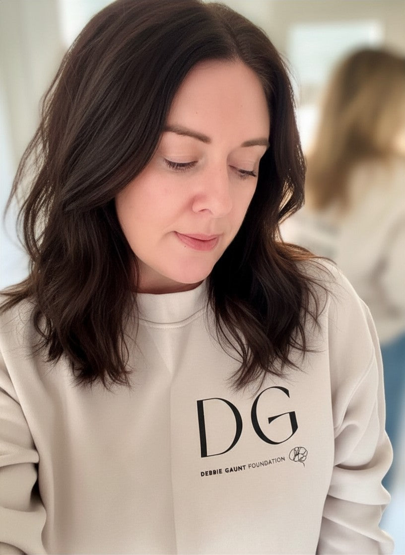 Unisex Jumper in Bone — front with DG logo